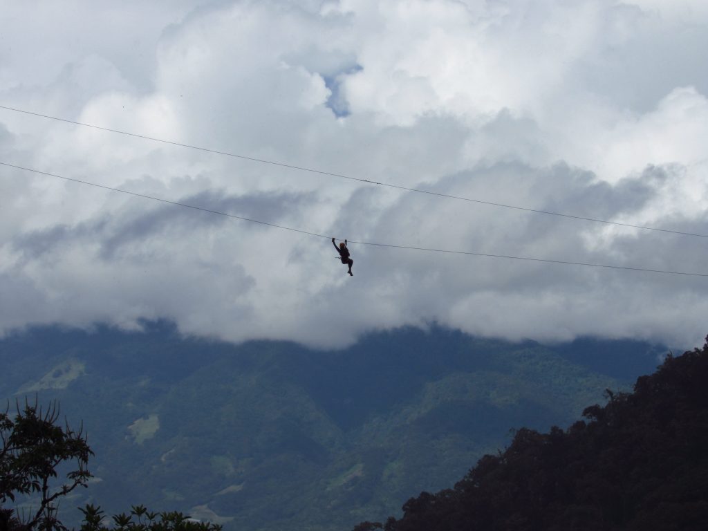 One of the group as they zipline in the clouds