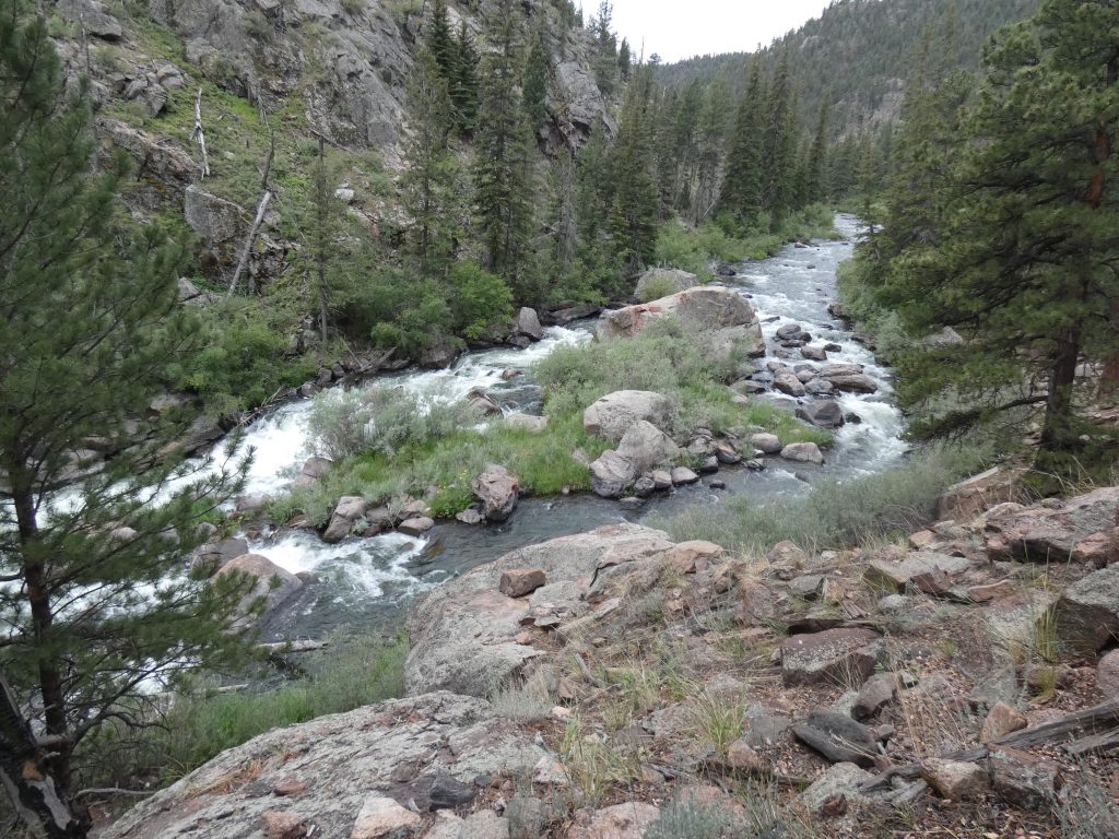 The river has more rapids north of our campsite as the canyon narrows