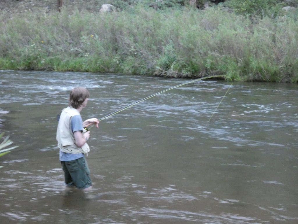 Edwin gets one on with a dry fly