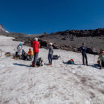 The crew making their way across the Muir Snowfield